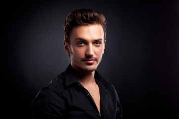 Fototapeta premium Young man's portrait. Close-up face.