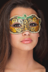 Beautiful Young Woman with Masquerade Mask