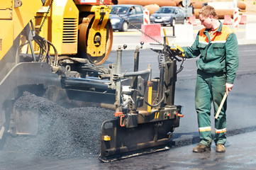 worker at asphalting works