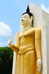 Yellow Buddha's statue in Thailand