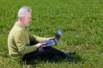 Grandfather with a laptop