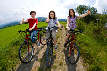 Family riding bikes