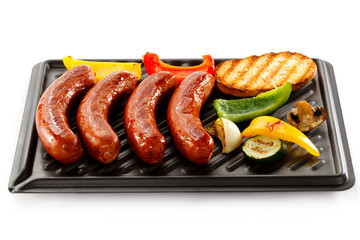Grilled sausages and vegetables