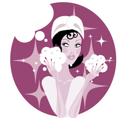 Spa beauty treatment / Woman in bathroom cleaning face with foam