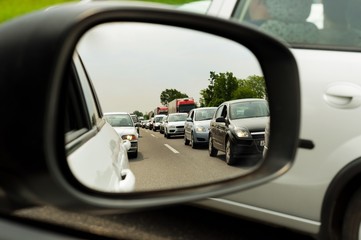 Traffic jam trough car mirror