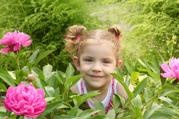 little girl in garden
