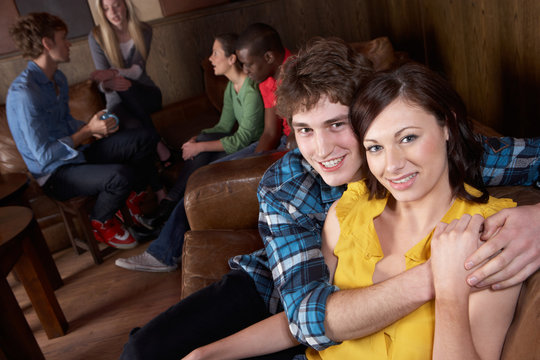 Young happy  couple in cafe