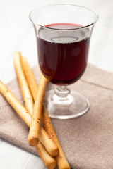 Grissini and a glass of wine