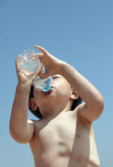 Little Boy drinking water