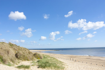 Fototapeta na wymiar Caister on sea beach and sand dunes
