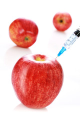 Apple and syringe