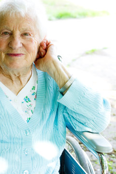 Beautiful Senior Lady In Wheelchair In Spring Day