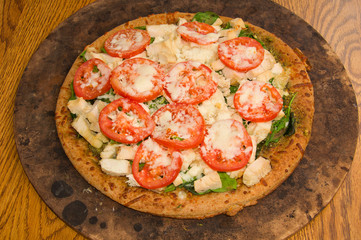 Pesto Spinach Tomato Pizza