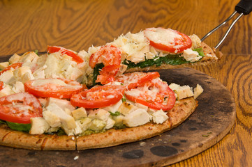 Pesto Spinach Tomato Pizza