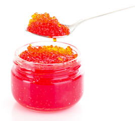 Red caviar on spoon isolated on white