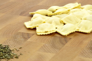 raw beef ravioli and italian herbs