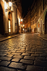 narrow alley with lanterns in Prague at night - obrazy, fototapety, plakaty