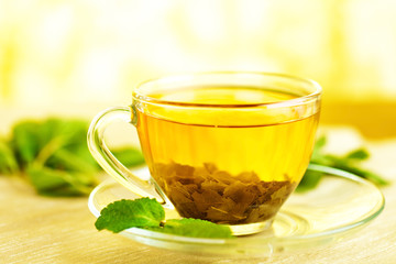 tea in cup with leaf mint