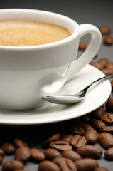 Cup of coffee and coffee beans
