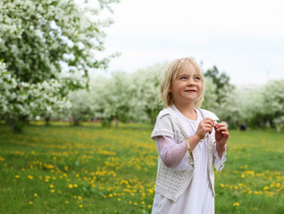 little girl in spring park