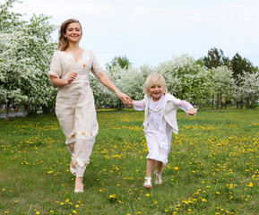 Fototapeta premium girl with mother in the park
