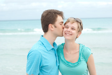 Fototapeta na wymiar Happy couple on the beach