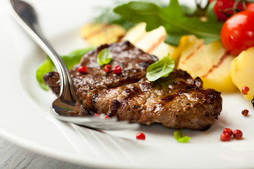 Grilled steak with grilled vegetables