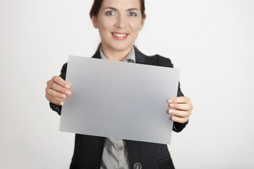 Fototapeta premium Holding a cardboard