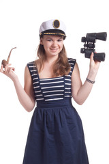 A girl in a sailor cap holding a pair of binoculars