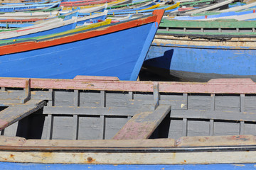 Fototapeta na wymiar Traditional fishing boats on the beach in Taghazout