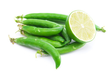 peas and lime isolated on white