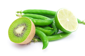 Fototapeta na wymiar lime,peas and kiwi isolated on white