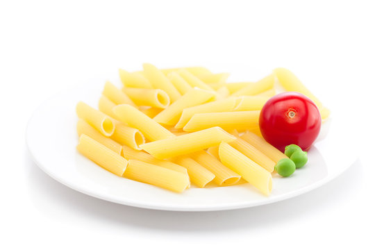 Tomato, Peas And Pasta On A Plate Isolated On White