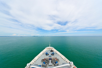 Cruise ship in open sea showing the bow, sea and sky