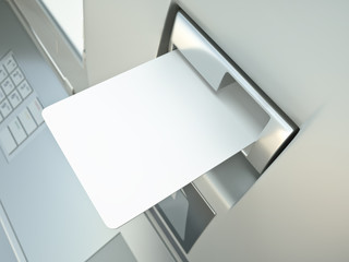 Blank credit card in a cashpoint slot