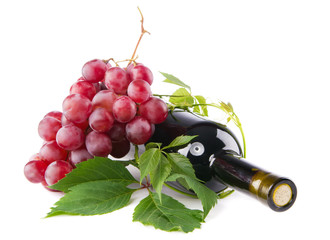 Bottle of red wine with grapes