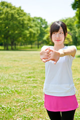 beautiful asian woman exercising in the park