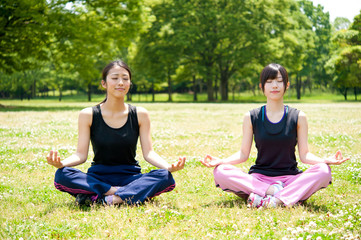beautiful asian women exercising in the park