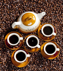 still life of coffee cups and coffeepot