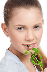 Young beauty woman with green parsley