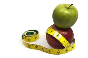 Measurement tape and apple