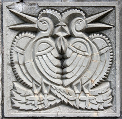 old bas-relief of fairytale two birds