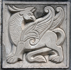 old bas-relief of fairytale winged lion