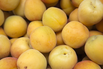 Fresh natural apricot to background