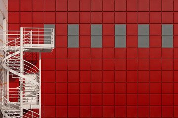 Winding stairs on a red background