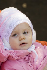 Portrait close up of the baby on walk.