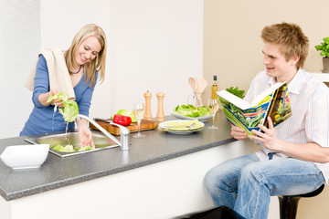 Lunch happy couple cook salad wash lettuce