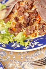 Uzbek national dish - plov with horse meat