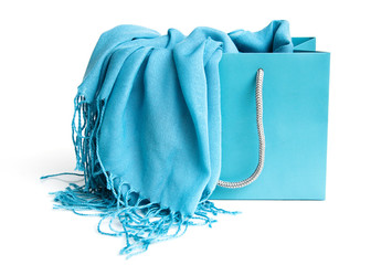 Blue scarf in shopping bag