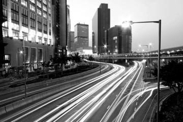 Traffic in Hong Kong at night in black and white